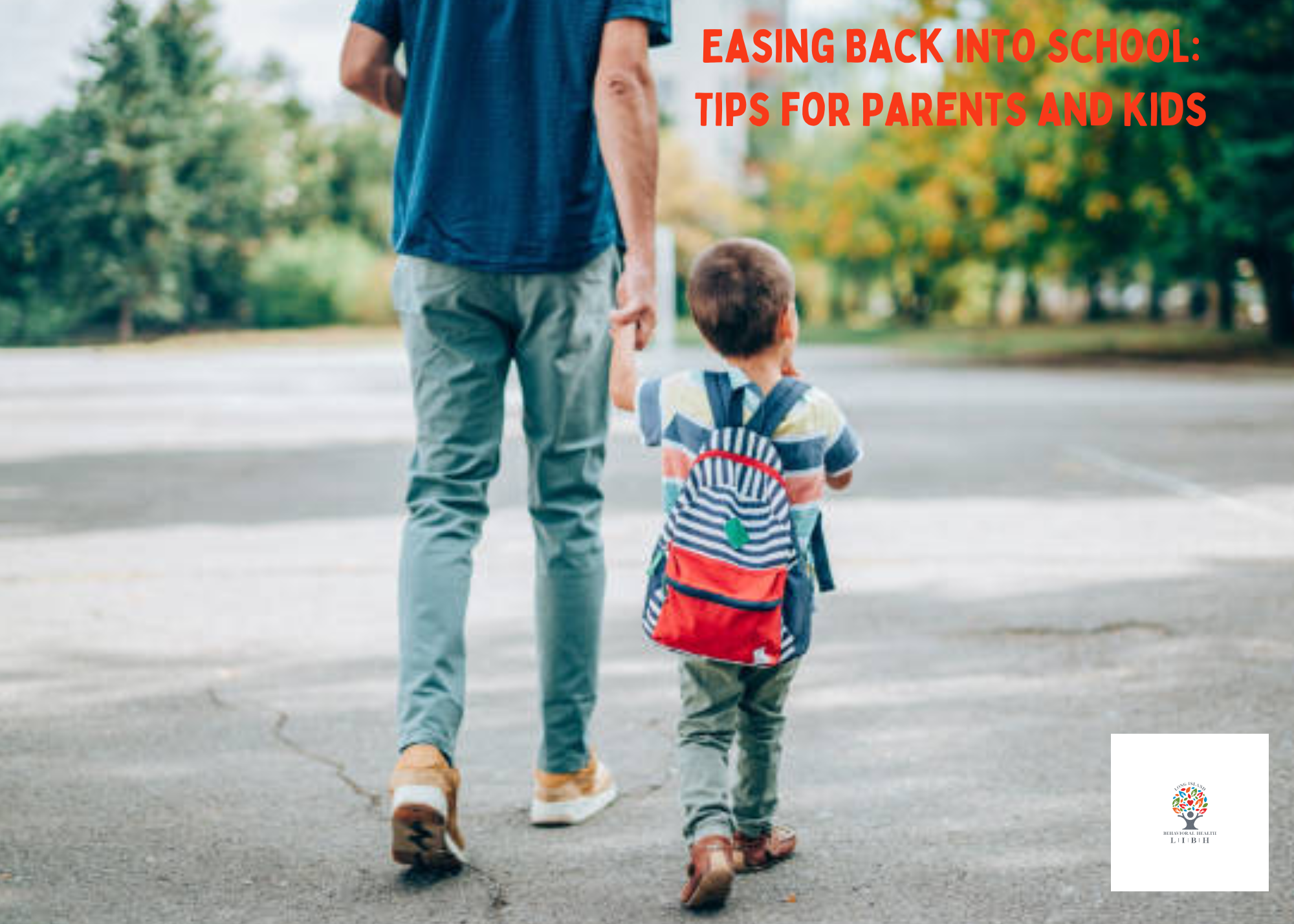 Father walking down the street holding hands with his child who is wearing a backpack